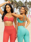 models standing side be side facing the opposite direction wearing the Wave wire bra in firestorm and crystal current color