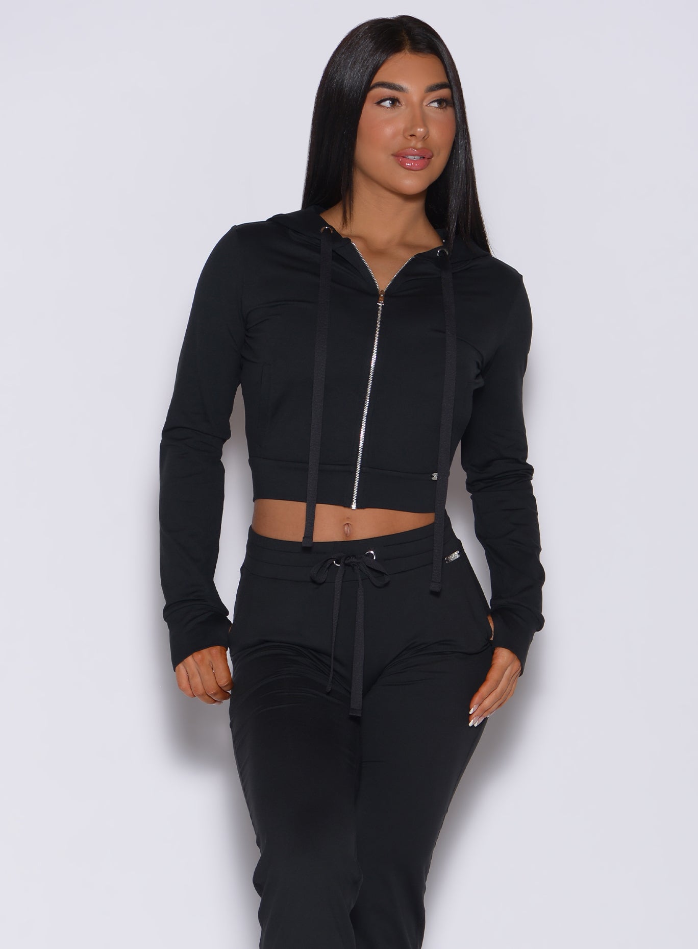 Black Signature Jacket featuring a full-zip front and sculpting seams for a tapered, athletic fit.