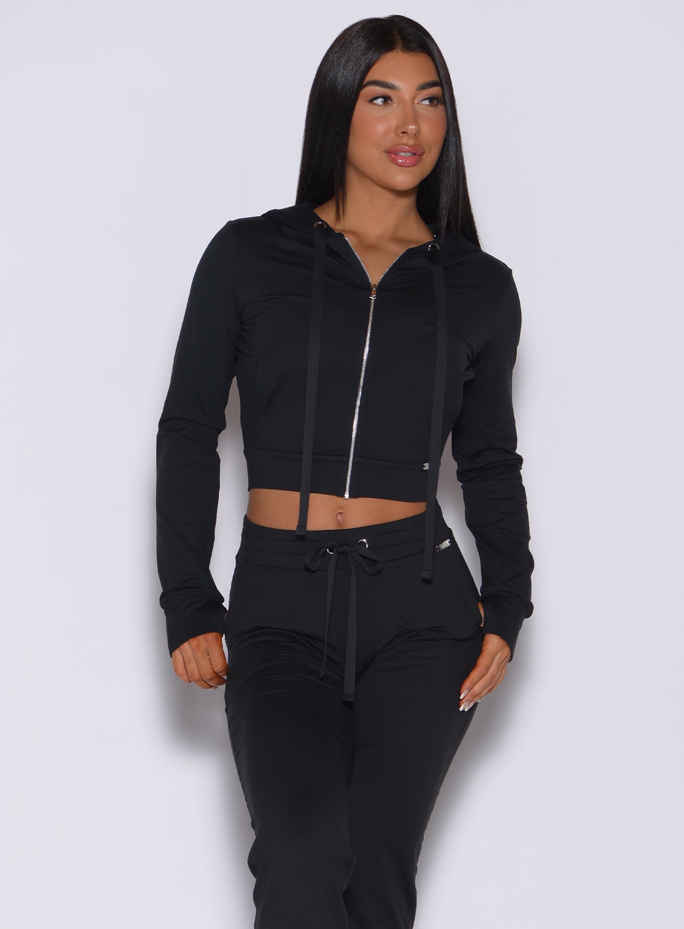 front view of model wearing the signature jacket in black