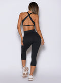 Black Smooth Capri Leggings with glute-defining scrunch detail and sculpted performance fit