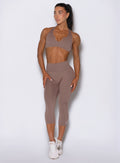 Smooth capri leggings in Cocoa feature a sculpting, high-waisted body-contouring fit design