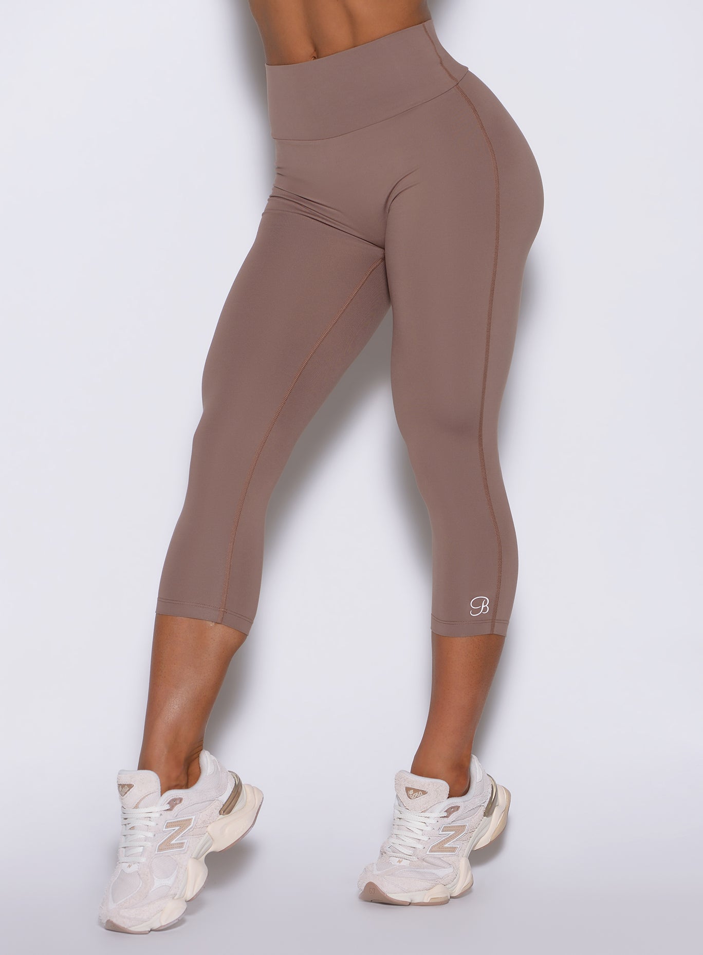 Close-up of the high-waisted Cocoa Smooth capris, providing a defined and sculpted shape
