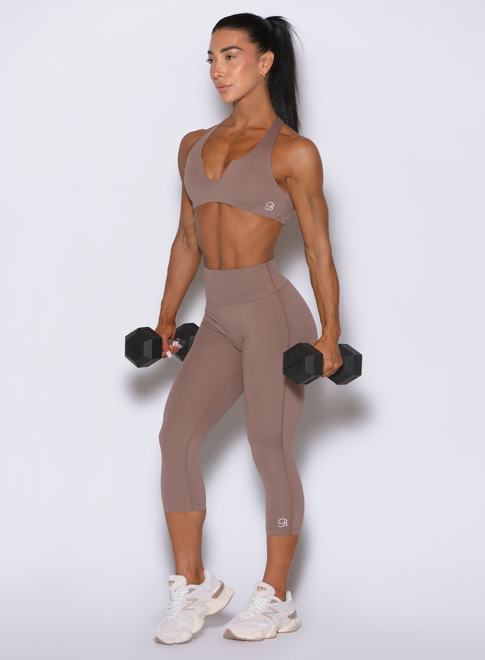 High-waisted cocoa capris with a sleek, sculpting athletic fit designed for all-day comfort