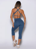 Lapis Blue Smooth Capri Leggings with glute-enhancing scrunch detail and sculpted gym fit