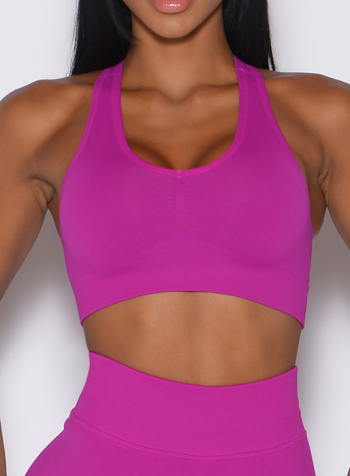 zoomed in front view of our smooth seamless bra in berry color 
