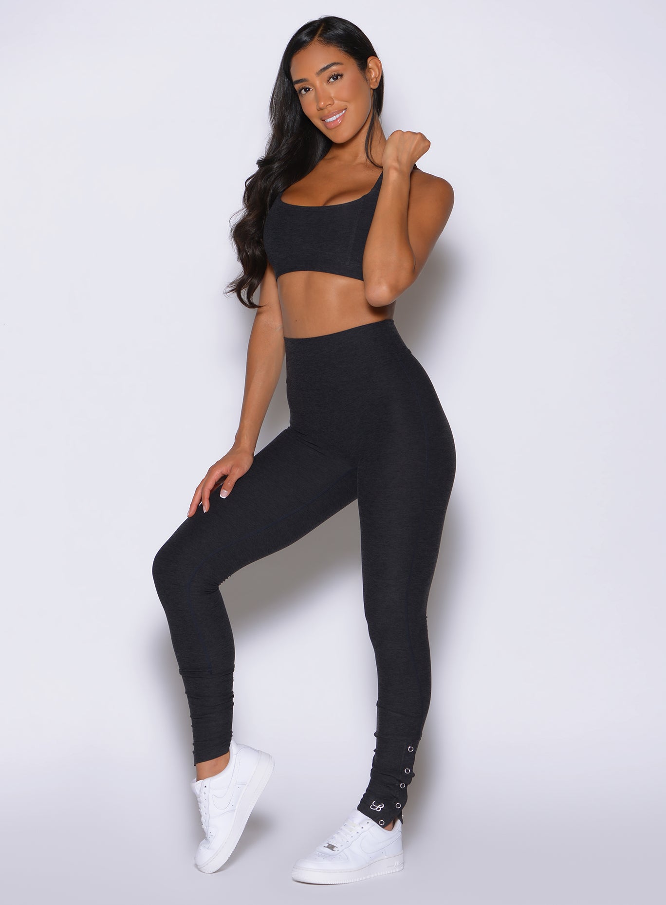Heathered Black Snap Flare Leggings with high-waist support and versatile adjustable ankle snaps.