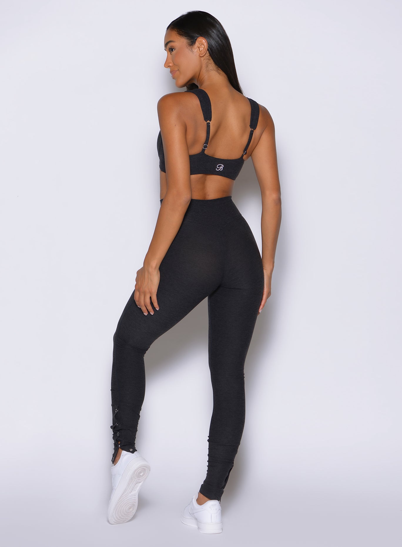 Heathered Black Snap Flare Leggings featuring an internal scrunch butt for a sculpted gym look.