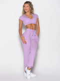 front profile view of a model looking to the right side wearing the Snap Rib Joggers in Spring Fairy color