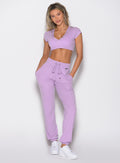 front profile view of a model wearing the Snap Rib Joggers in Spring Fairy color