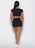 back profile view of a model wearing the Snap Rib Shorts in black color