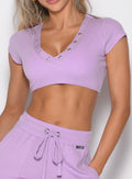close up front profile view of a model wearing the Snap Top in Spring Fairy color
