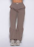 close up front view of a model wearing the Society Joggers in Espresso color