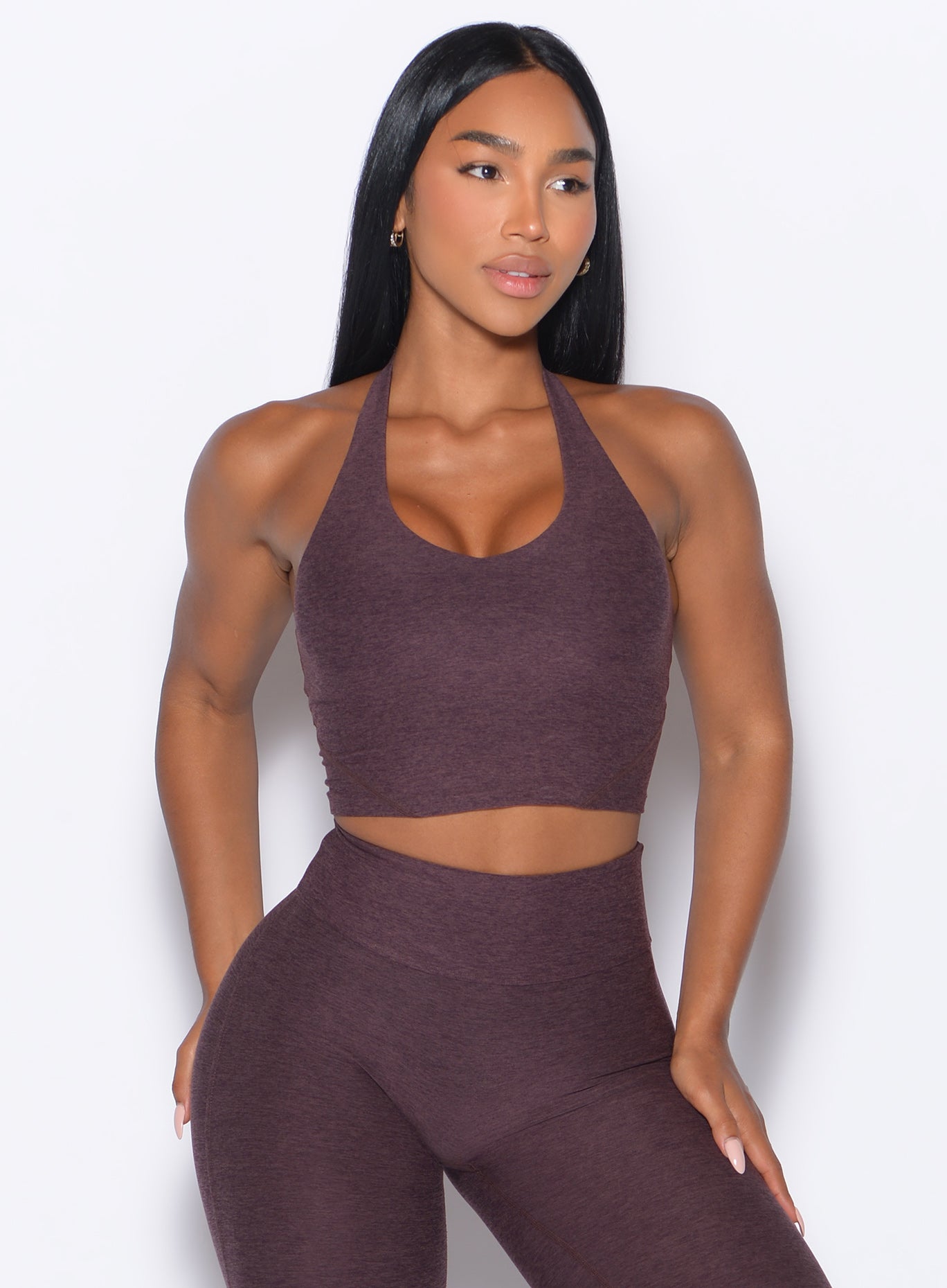 Peppercorn Lift Halter Bra with a deep V-neck and adjustable strap for targeted gym performance.