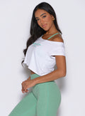 left side view of a model wearing the Star Power Tee in white color
