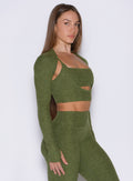 Juniper Studio Sculpt Bolero with long sleeves and thumbholes for an elevated gym layering look.