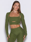 Juniper Studio Sculpt Bolero; a soft heathered layering piece for stylish studio-to-gym transitions.