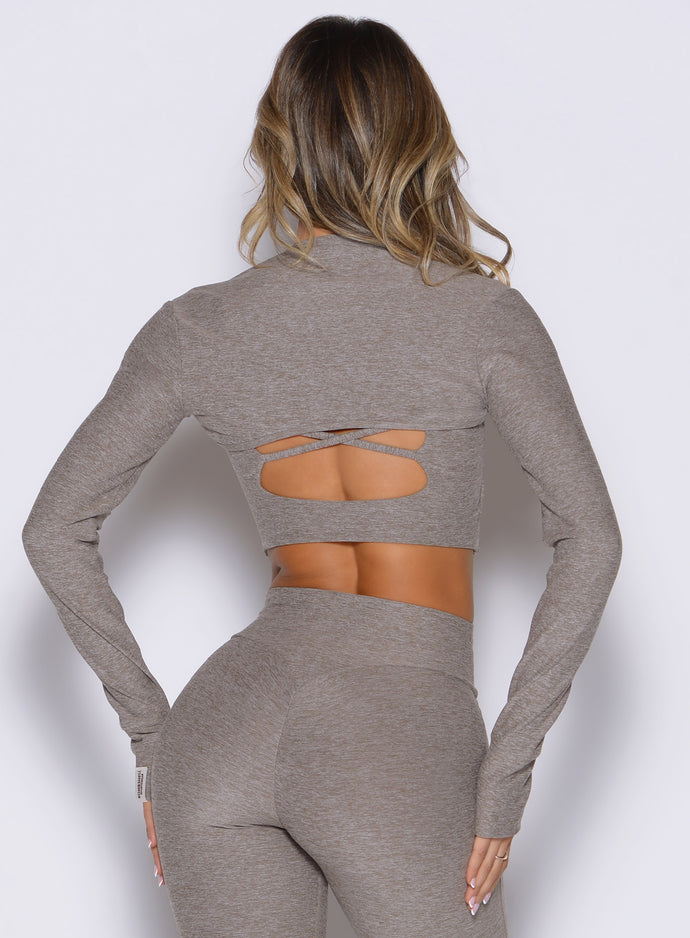 back side view of a model wearing the Studio Sculpt Bolero in smoked taupe color