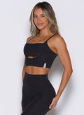 Heathered Black Studio Sculpt Bra with a clean neckline and front cutout for a contoured gym fit.