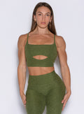 Juniper Studio Sculpt Bra with a sleek front keyhole and supportive binding for high-impact yoga.