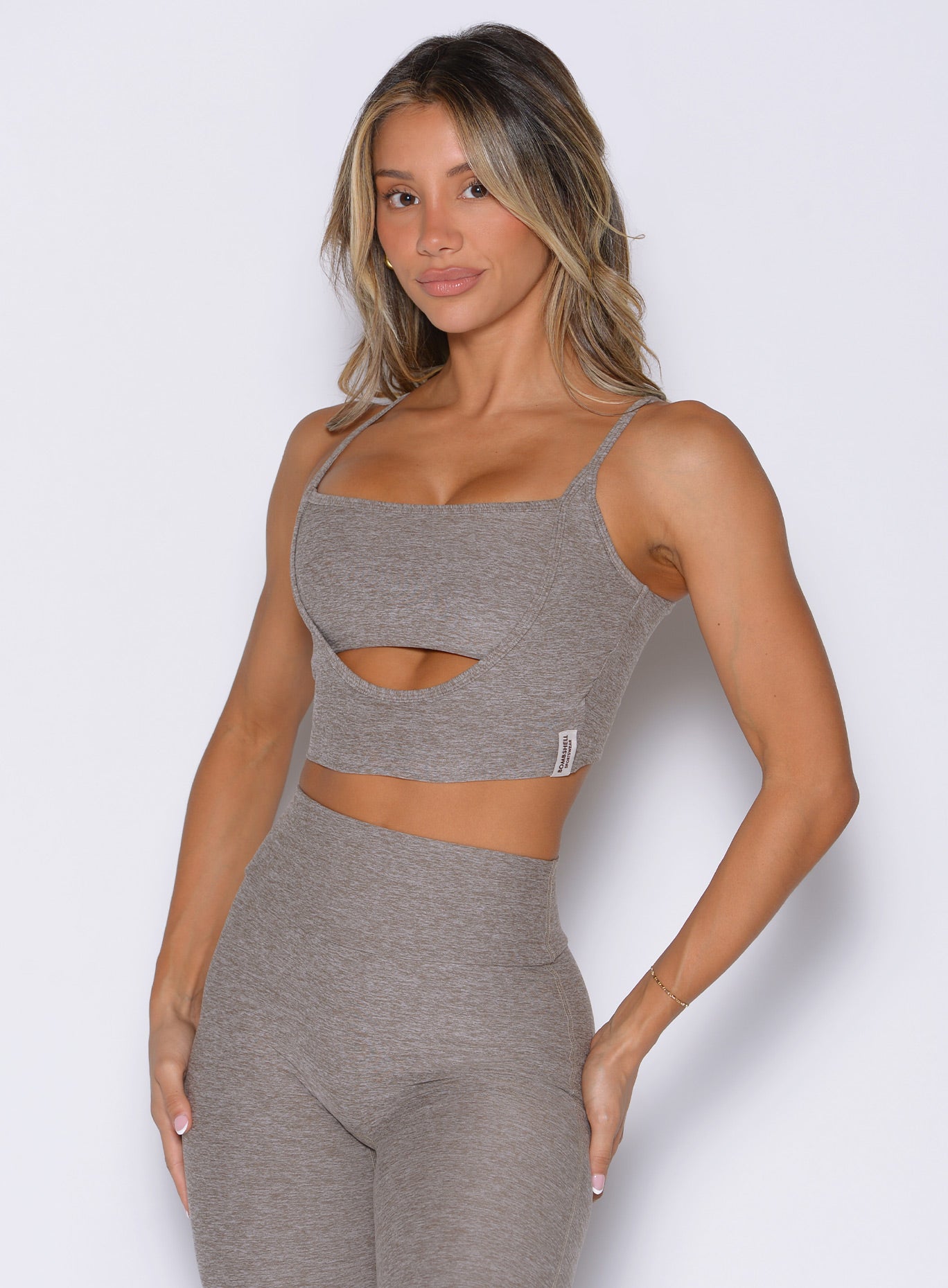 Smoked Taupe Studio Sculpt Bra featuring a chic front cutout and adjustable straps for the gym.