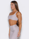 front left side profile shot of a model wearing the Super set bra in violet ice color