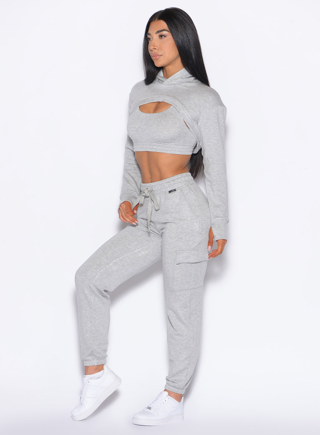 mode captured from the left side wearing the Sweat Joggers in Heather grey color
