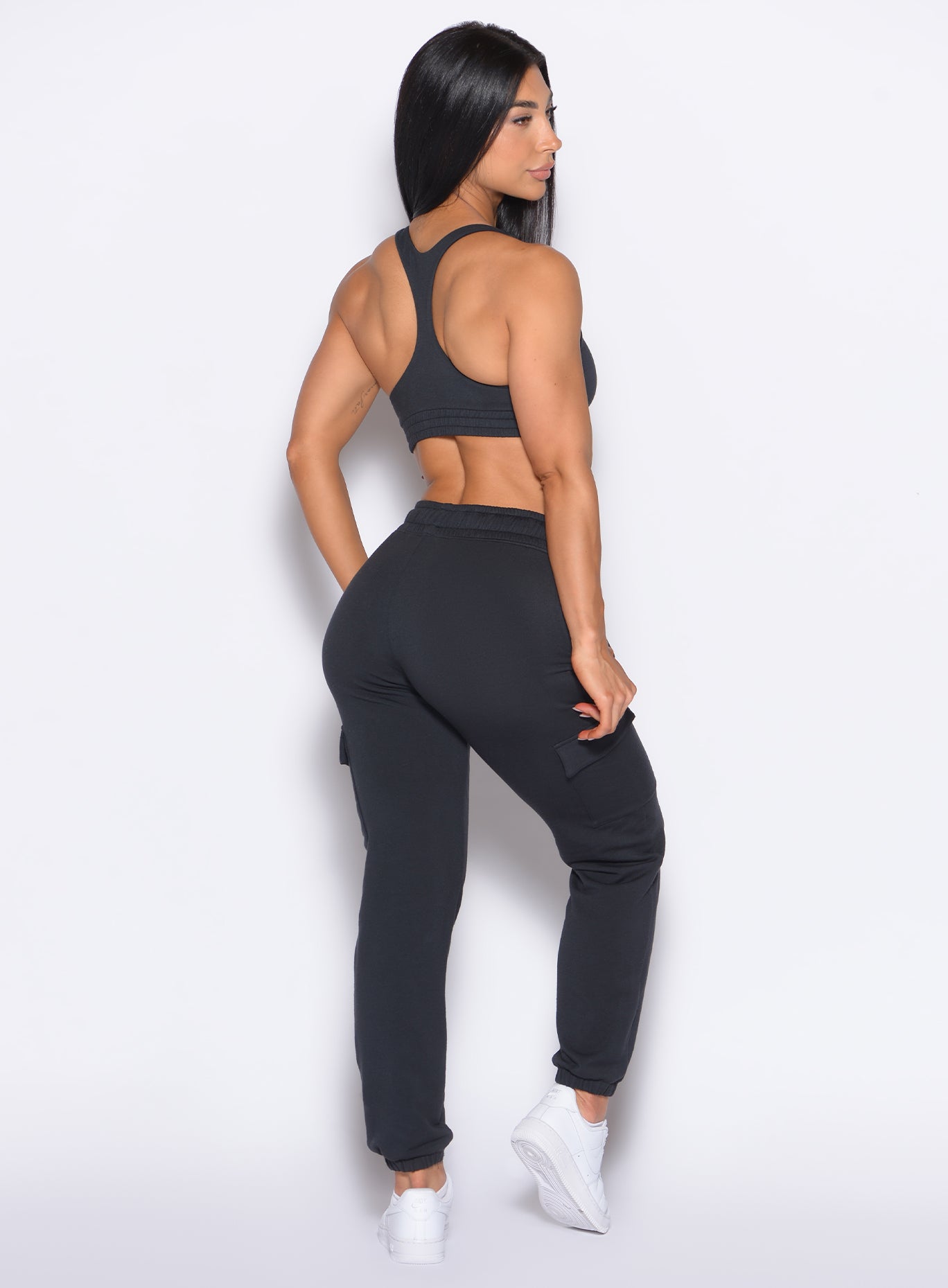 Relaxed Vintage Black Sweat Joggers featuring cuffed ankles for a stylish, post-workout gym fit.