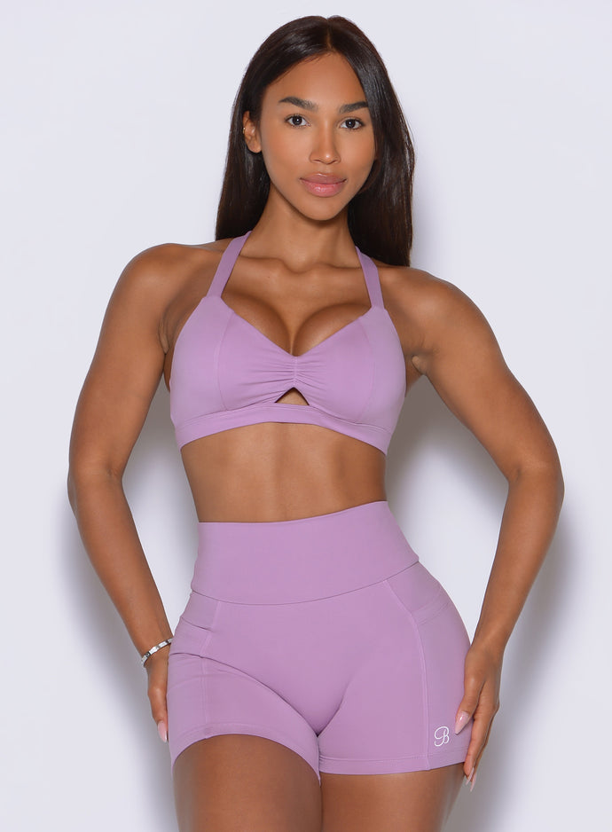 High-performance Smokey Grape workout bra displaying defining princess seams and a molded cup