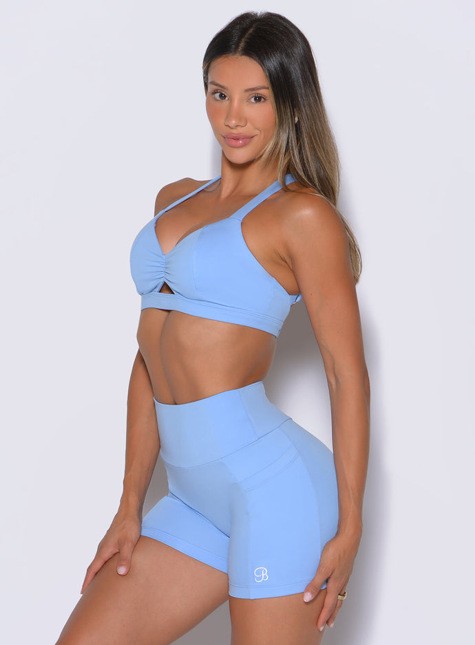 Sculpting Vista Blue workout bra displaying a supportive side profile and scrunched center.