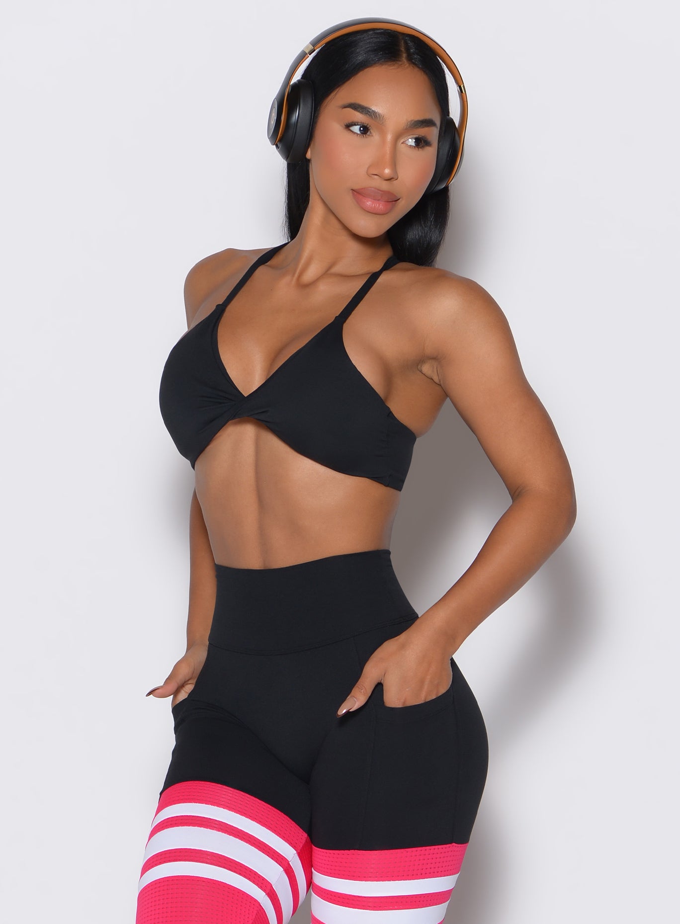 Black Twist Mini Bra with push-up support and racerback straps for high-intensity gym sessions.