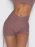 Close-up of walnut Tiny Waist Tie Shorts featuring adjustable side ties and a sculpting high-rise fit.