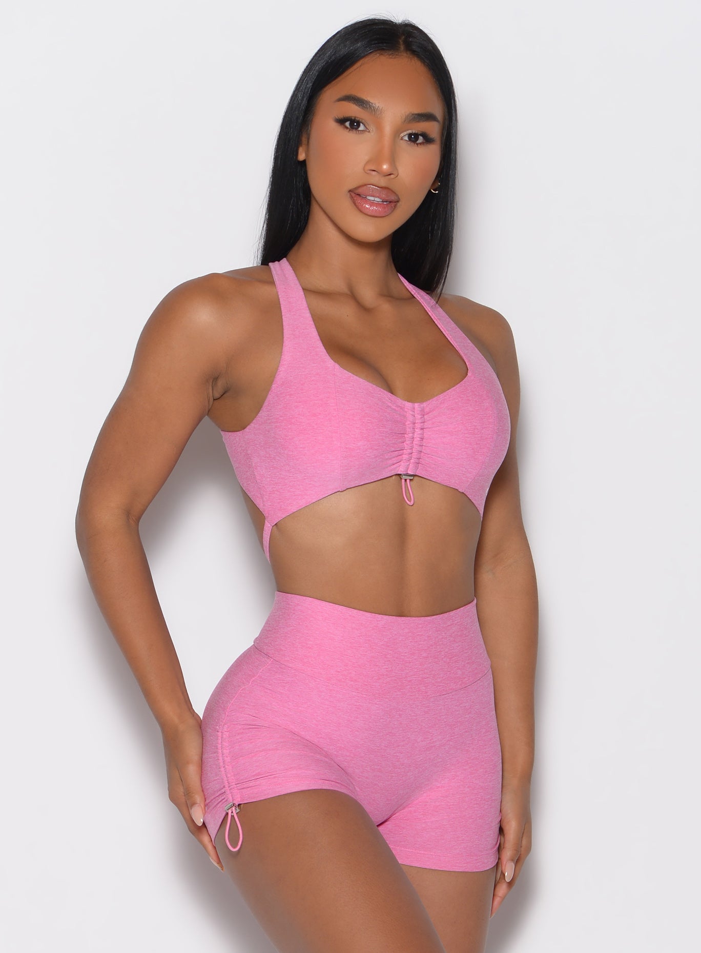 High-impact Bubblegum Toggluxe Bra with a front adjustable toggle and supportive overlap straps.