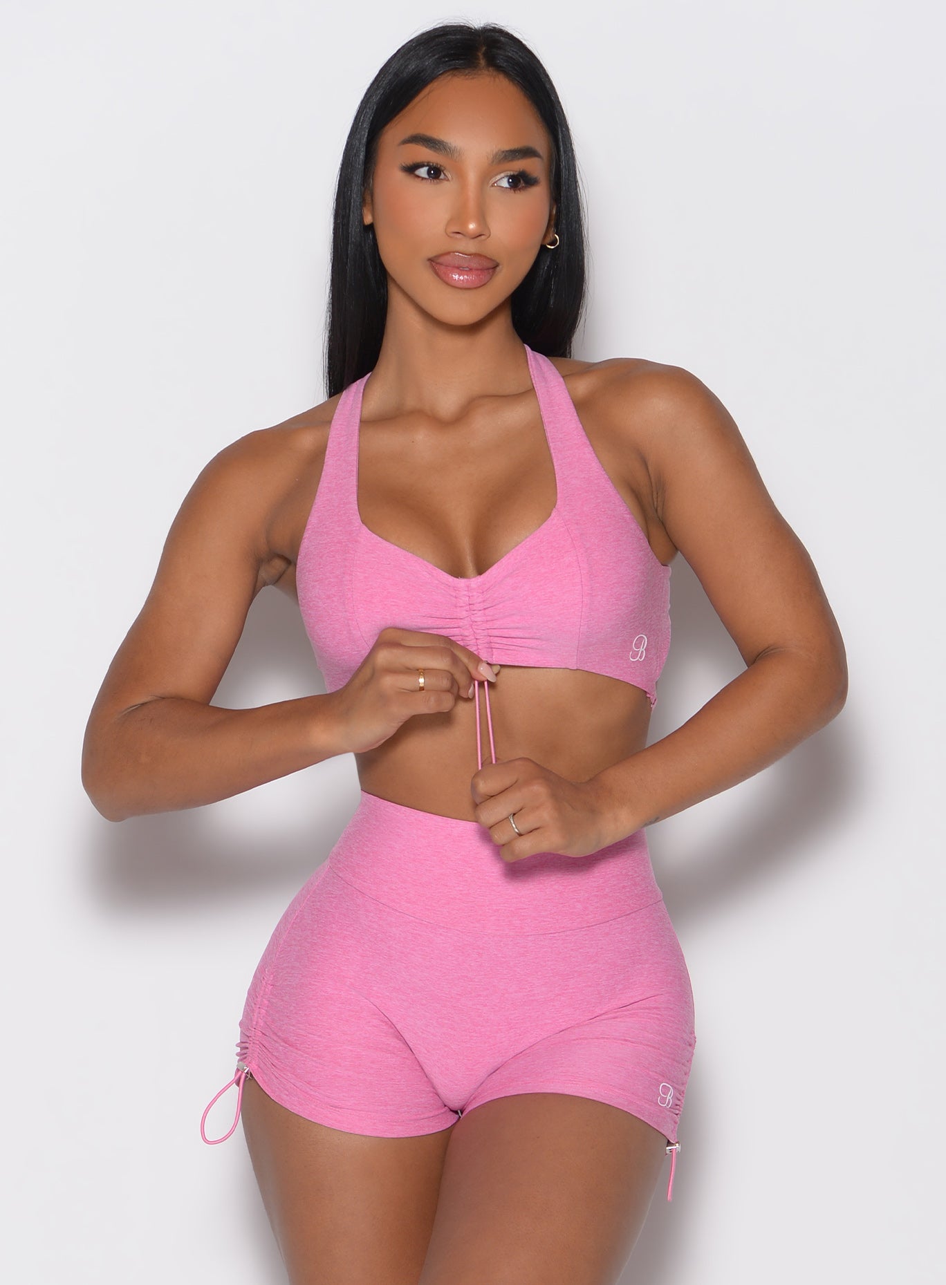 Heathered Bubblegum Toggluxe Bra featuring an adjustable front toggle for a custom, sculpting gym fit.