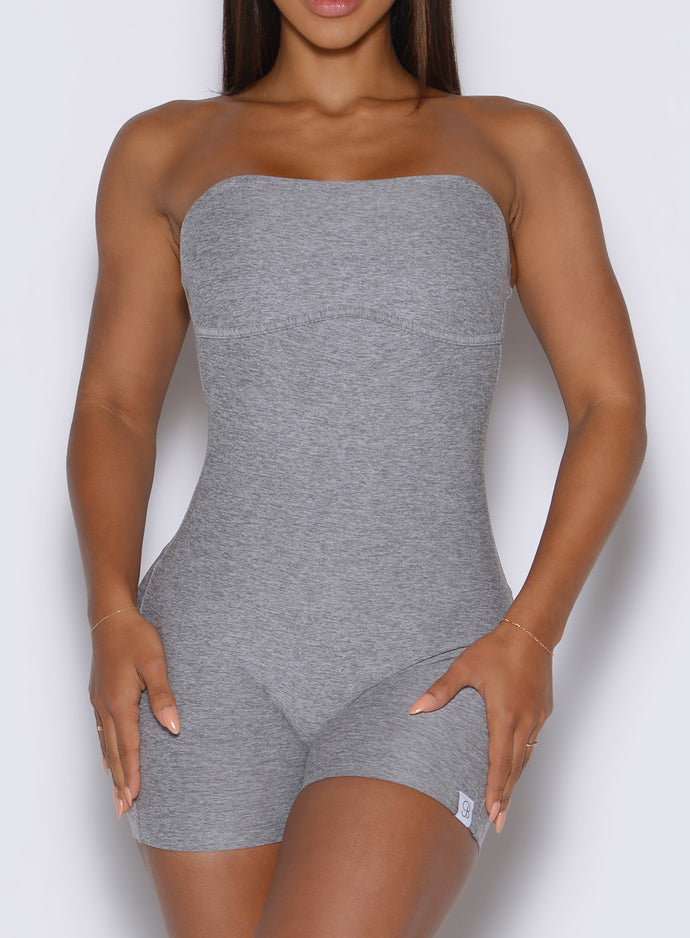 close up front view of a model wearing the True form Bodysuit shorts in dark and stormy color