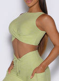 a left side view of a model wearing the Two cute tank bra in serpentine color