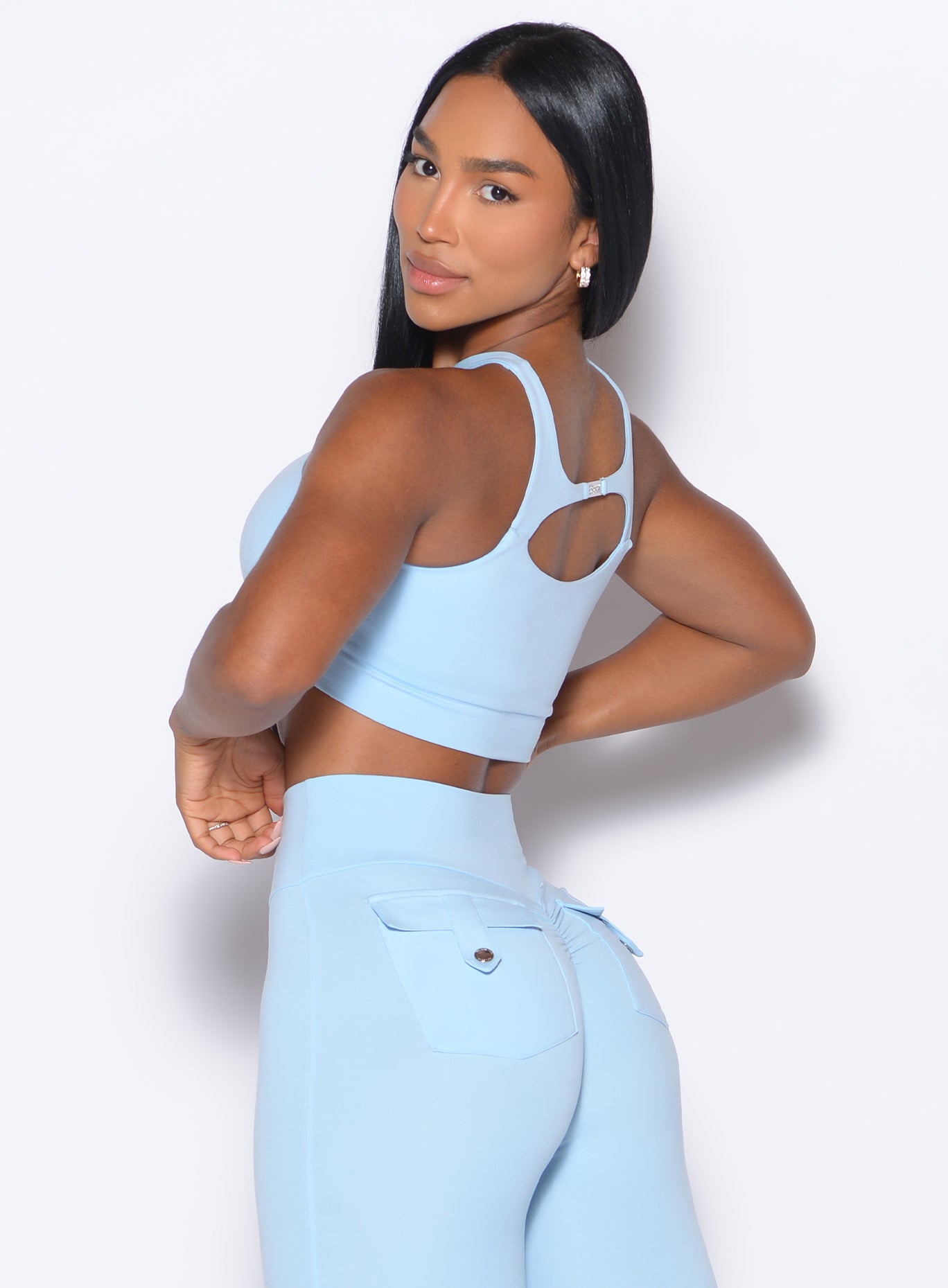 Sculpting Glacial Blue Two Way Bra with a supportive back view; designed for high-impact training.