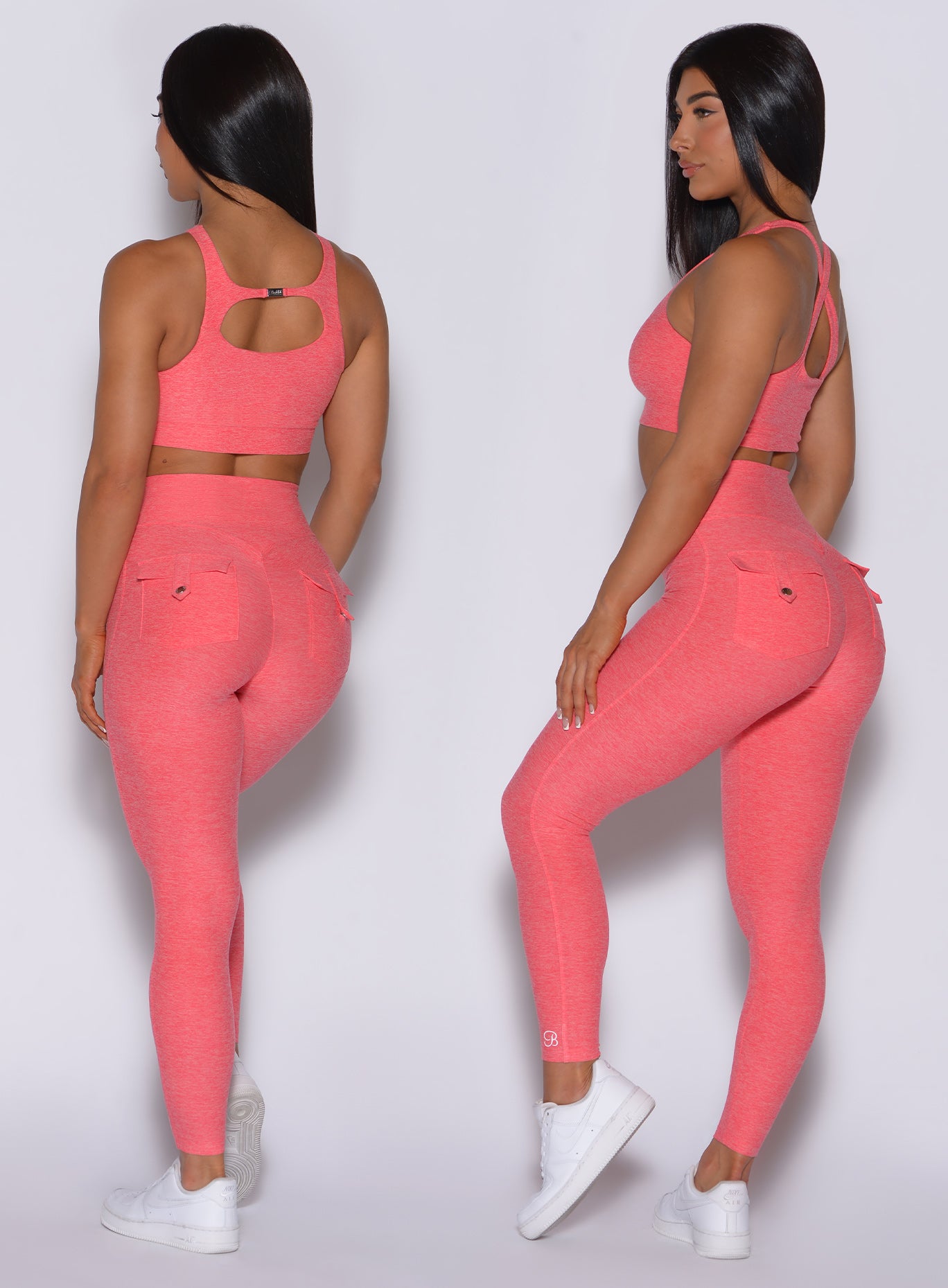 two back profile pictures of a model showing off our pocket rib leggings and a two way bra in papaya color 