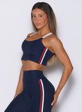 Front left view of cosmic blue United Tank featuring a signature bold color block collar detail.