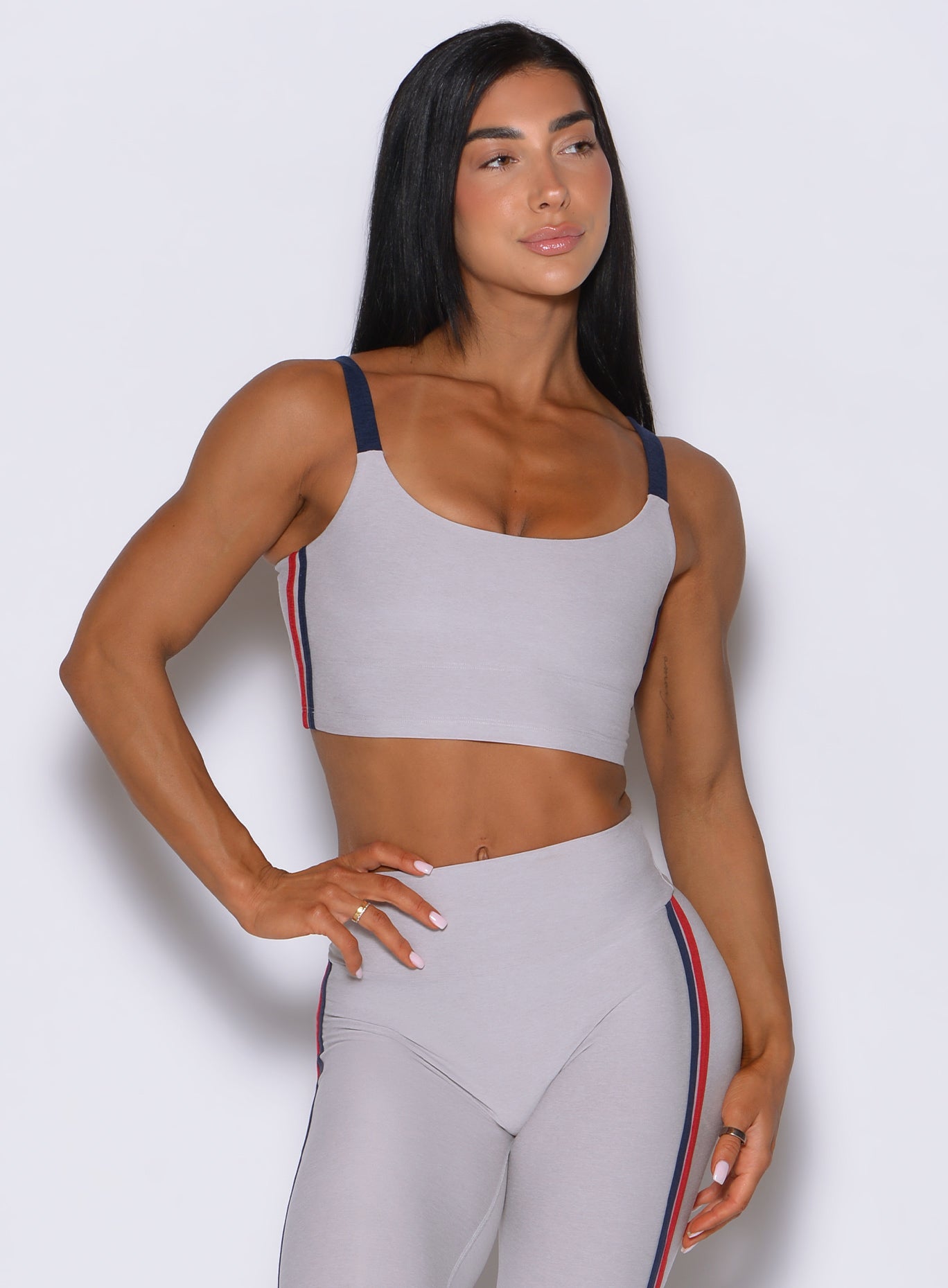 Clean front view of the United Tank in Ice emphasizes a performance-ready, mid-length crop cut.