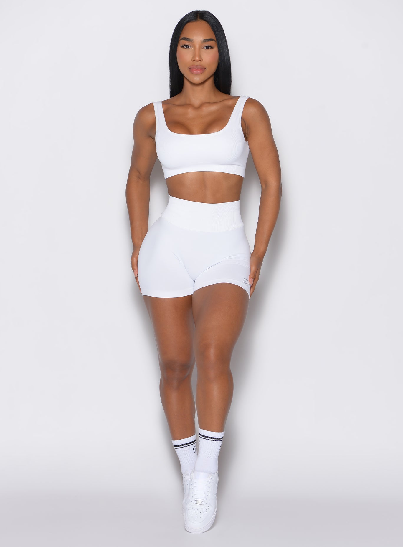 front profile of model wearing the v back seamless set in white