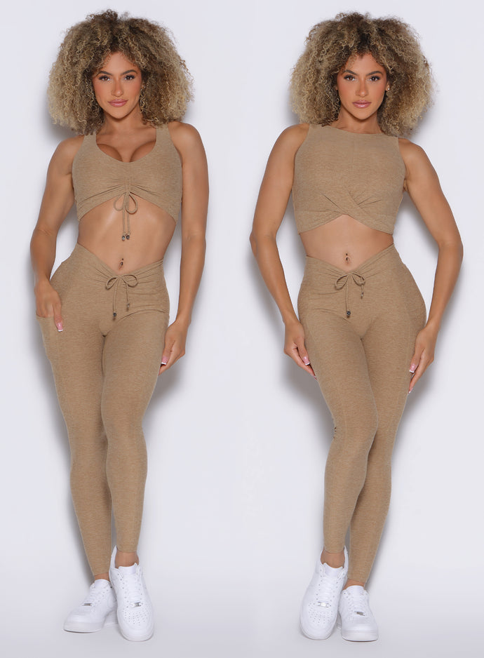 front profile view of a model showcasing the two way wearing option of the Two Cute Tank Bra in sandstone color