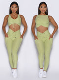 front view of a model showcasing the two way wearing option on the Two Cute Tank Bra in serpentine color