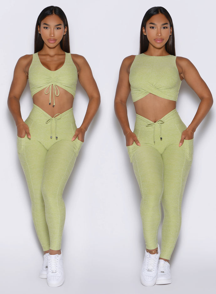 front view of a model showcasing the two way wearing option on the Two Cute Tank Bra in serpentine color