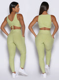 back profile view of a model showcasing the two way wearing option of the Two Cute Tank Bra in serpentine color
