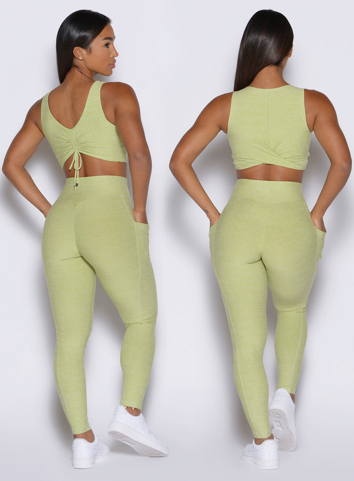 back profile view of a model showcasing the two way wearing option of the Two Cute Tank Bra in serpentine color