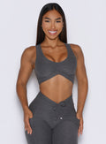 model captured from the front wearing the Two cute tank bra in steel shadow color paired with the matching leggings 