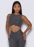 front view of a model wearing the Two Cute Tank Bra in steel shadow color paired with the matching leggings 