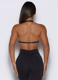 Open, strappy back design on the heathered Obsidian Black Bombshell Sportswear Voltage Bra