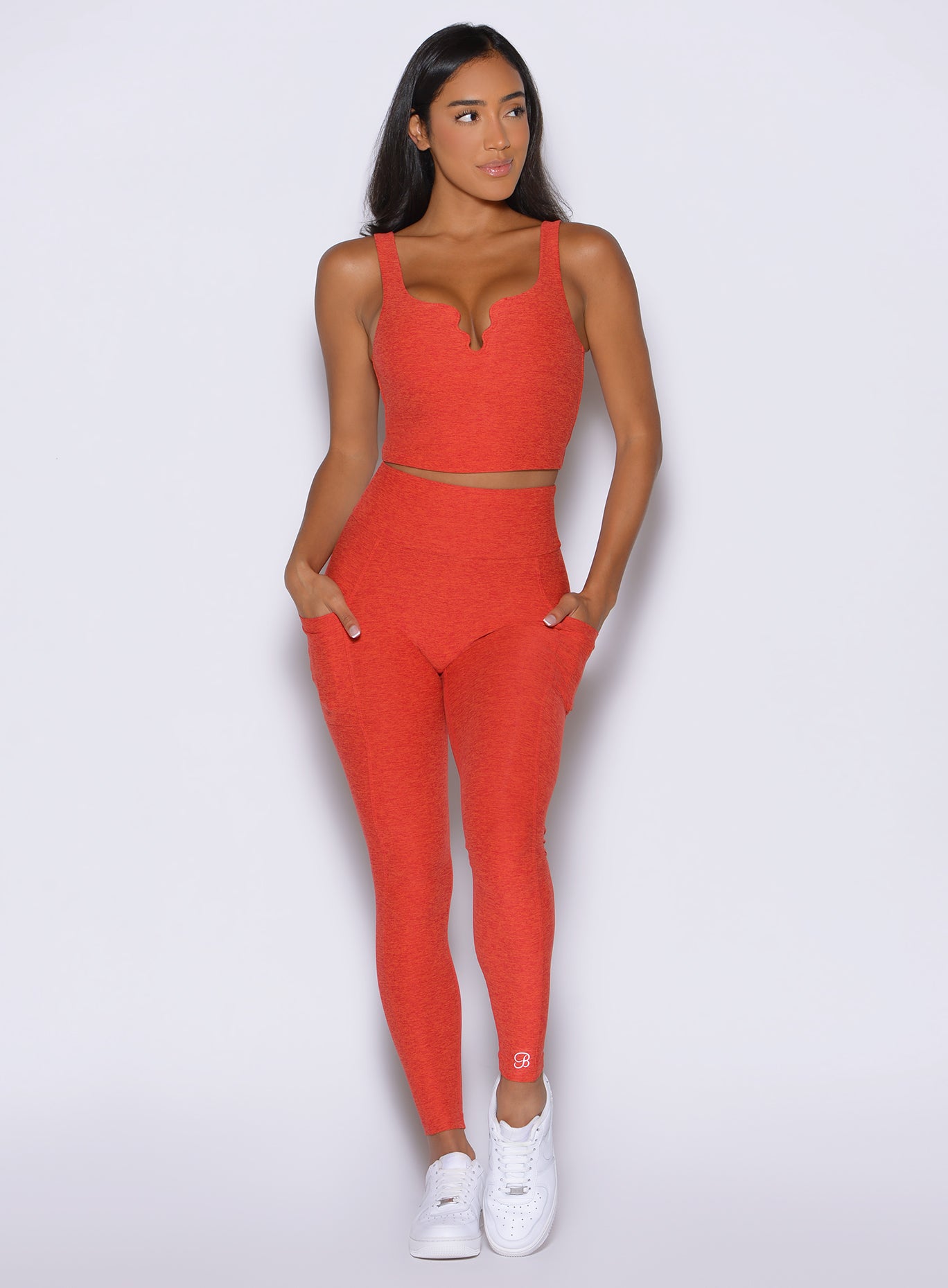 Firestorm Wave Wire Leggings with signature scrunch butt and side pockets for a sculpted gym look.
