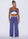 Front view of model wearing Bombshell Sportswear wide leg joggers in Future Dusk color, featuring relaxed flowy fit, adjustable drawstring waistband, and soft lightweight fabric for everyday wear